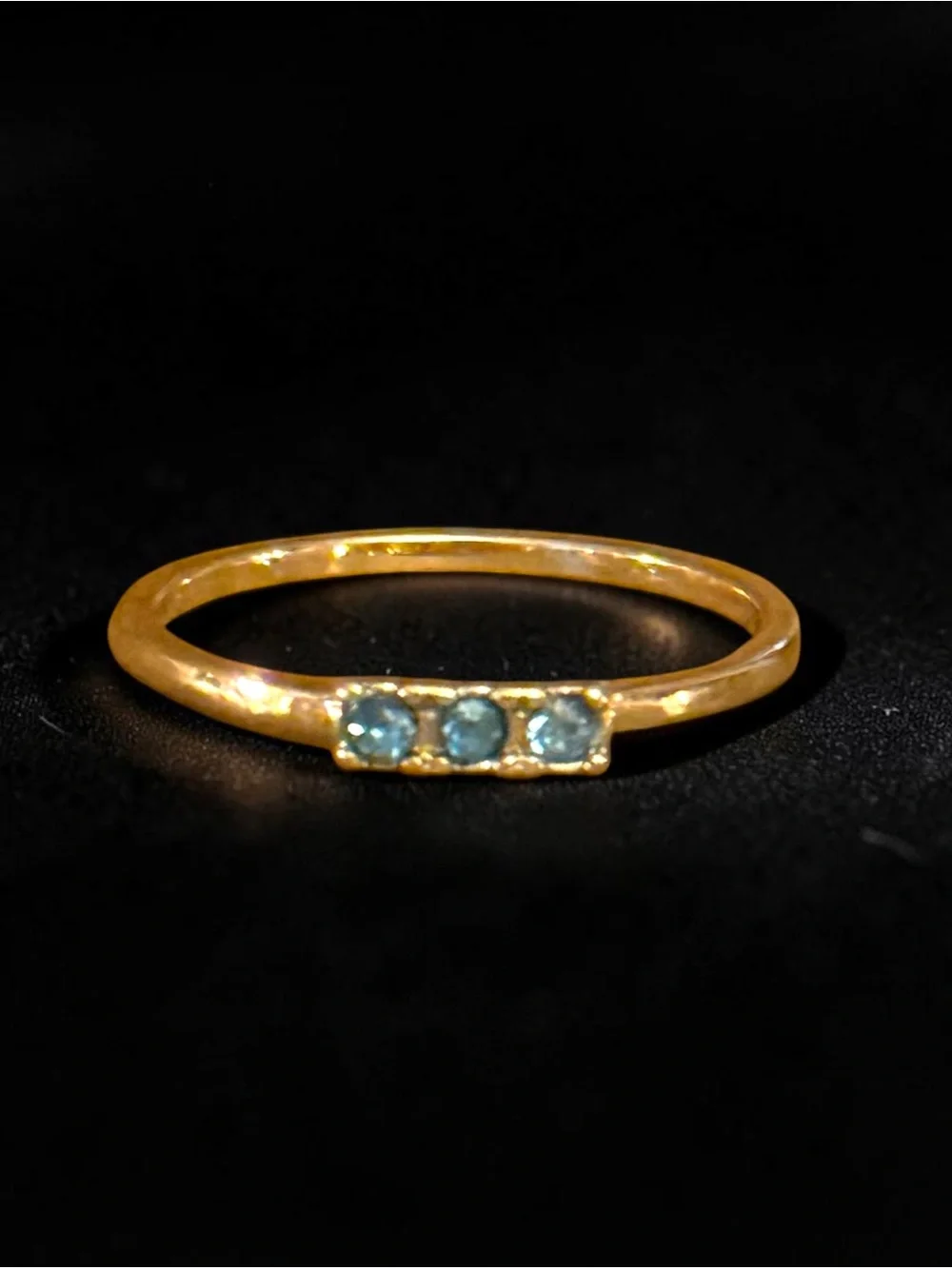 Dainty gold tone triple bezel set aquamarine ring